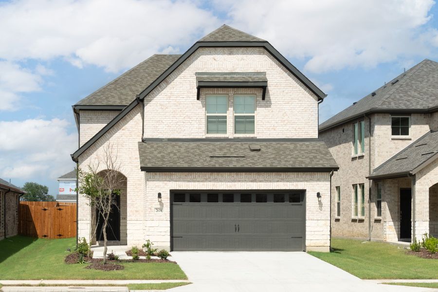 Front exterior of a new home in Churchill, Anna, TX, highlighting curb appeal (Image 1). Front exterior of a new home in Churchill, Anna, TX, highlighting curb appeal (Image 1).