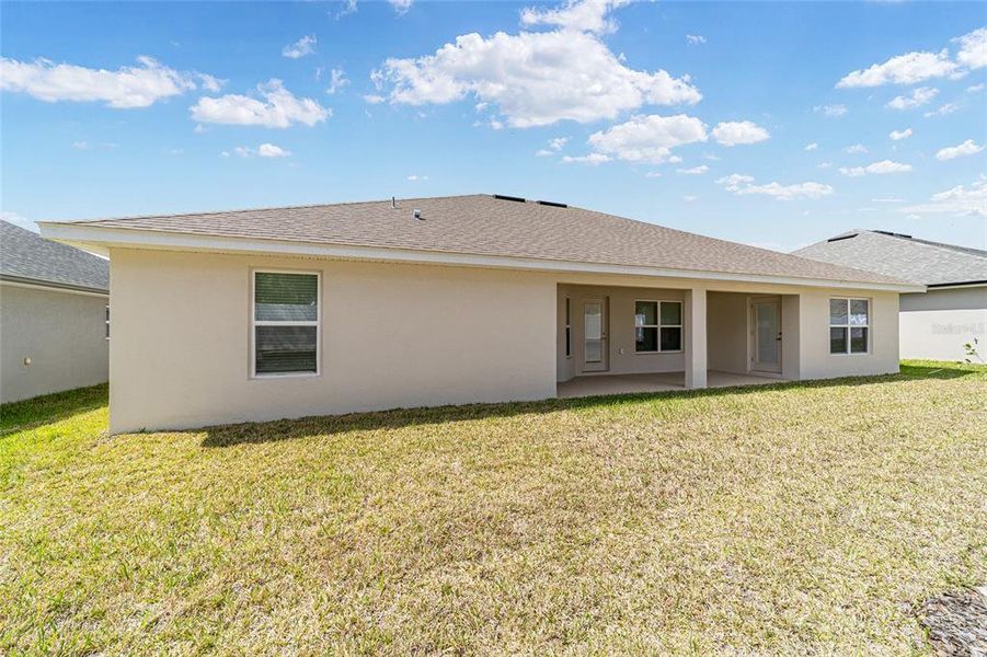 Exterior details and patio area of a home in Brookhaven, Ocala (Image 35).