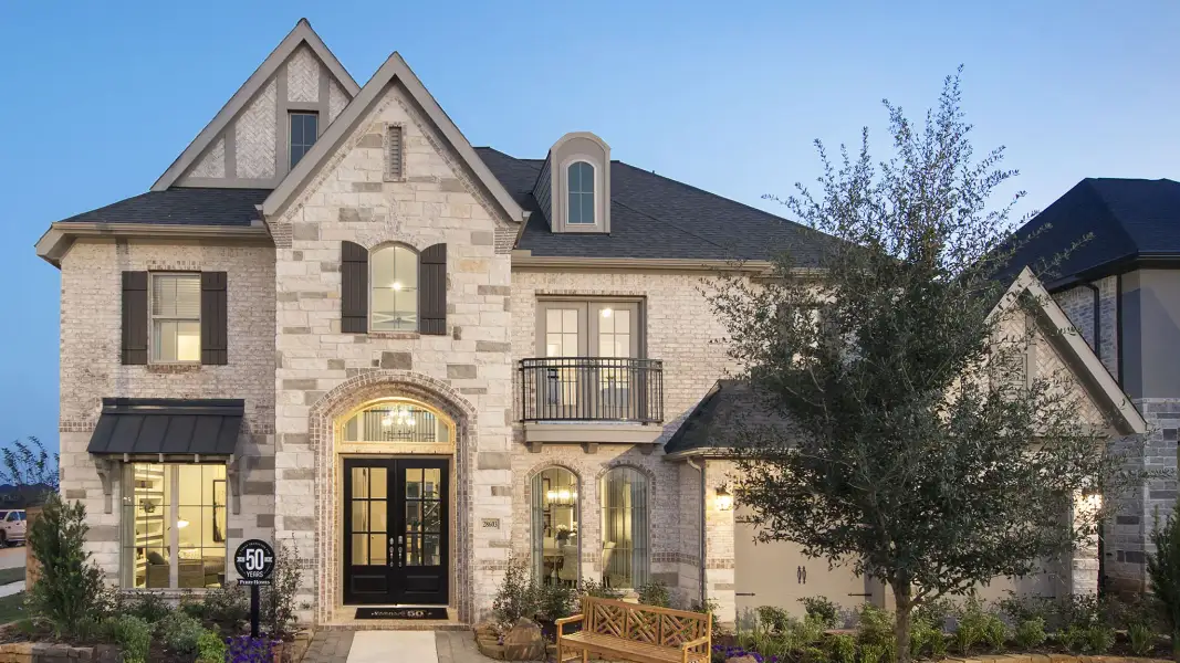 Front exterior of a new home in Candela, Richmond, TX, highlighting curb appeal (Image 20).