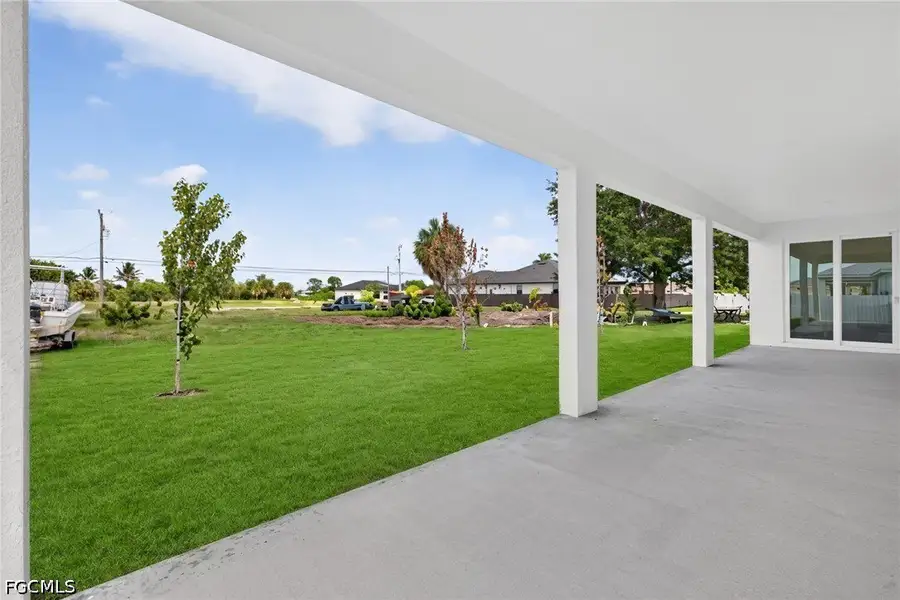 Exterior details and patio area of a home in Cape Coral, Cape Coral (Image 4).