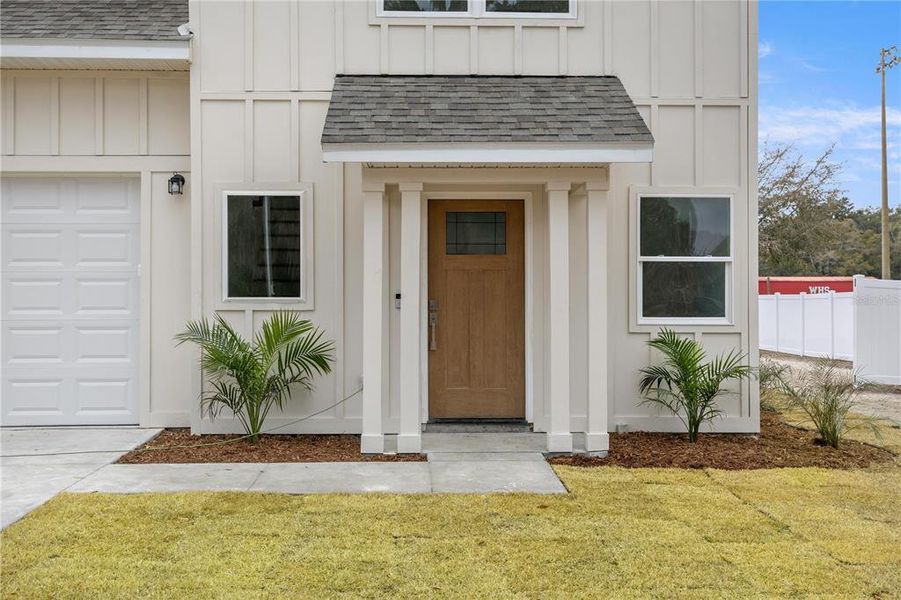 Exterior details and patio area of a home in , Williston (Image 3).