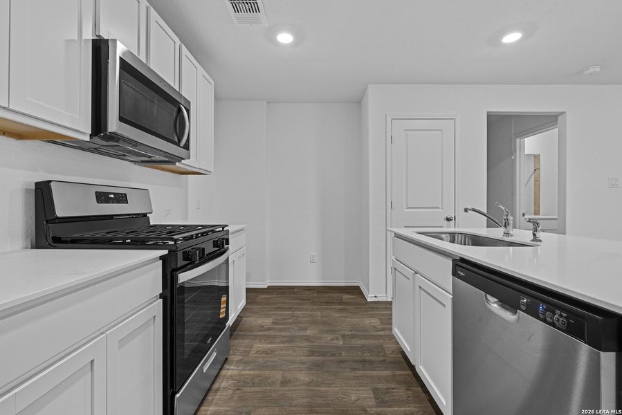 Furnished interior view inside a new home in Avenida, Converse (Image 6).