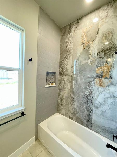 Second bath featuring amazing large format porcelain tile