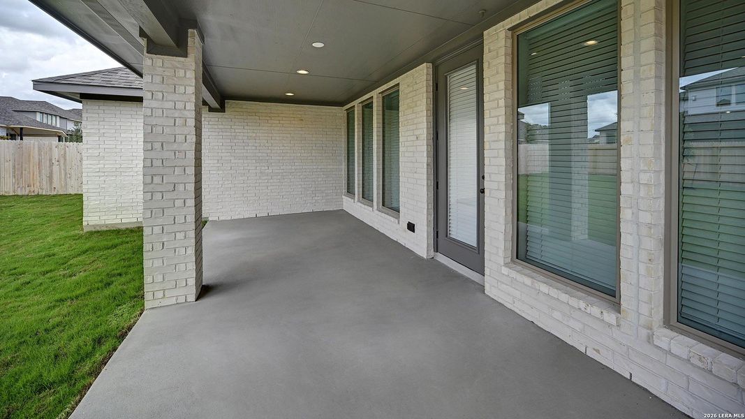 Exterior details and patio area of a home in Kallison Ranch, San Antonio (Image 24).
