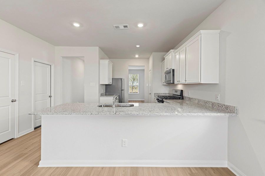 Furnished interior view inside a new home in Emberly, Beasley (Image 4).