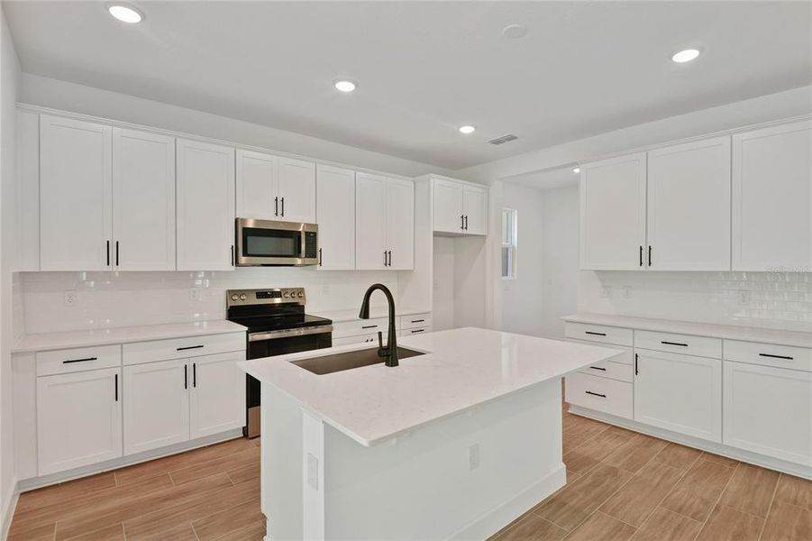 Furnished interior view inside a new home in Seasons at Wekiva Ridge, Mount Dora (Image 6).
