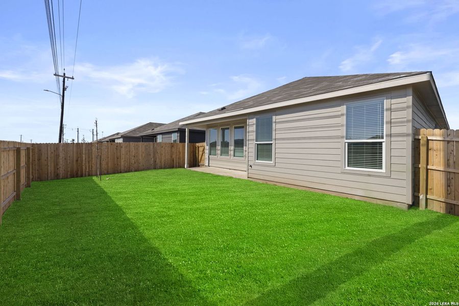 Exterior details and patio area of a home in Voss Farms, New Braunfels (Image 2).