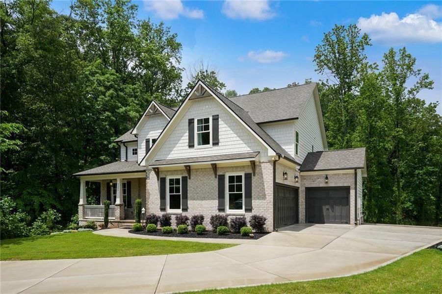 Front exterior of a new home in , Roswell, GA, highlighting curb appeal (Image 1).