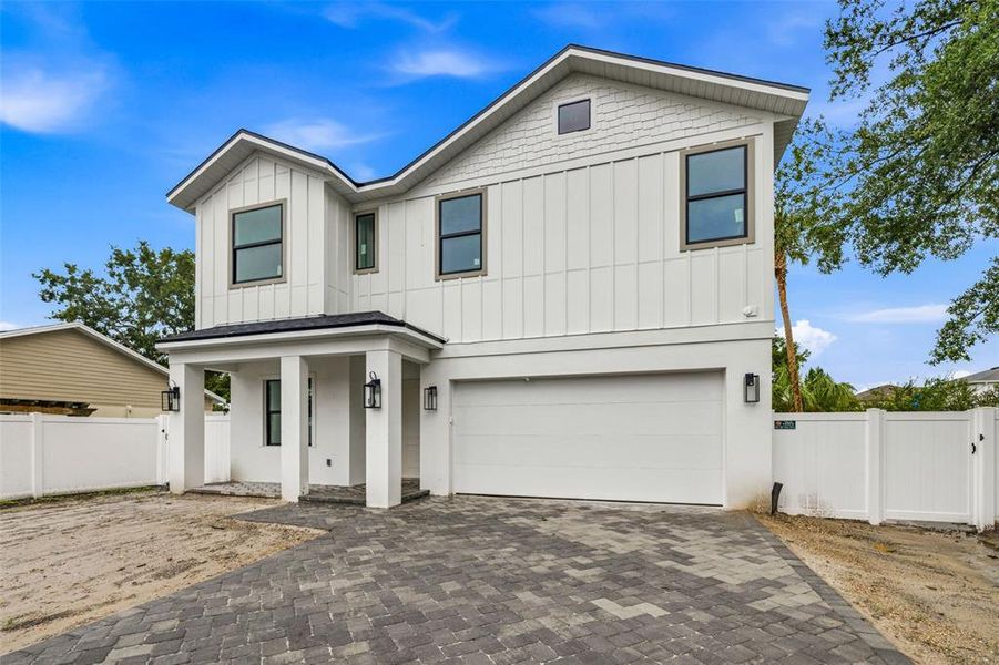 Front exterior of a new home in , Tampa, FL, highlighting curb appeal (Image 2). Front exterior of a new home in , Tampa, FL, highlighting curb appeal (Image 2).