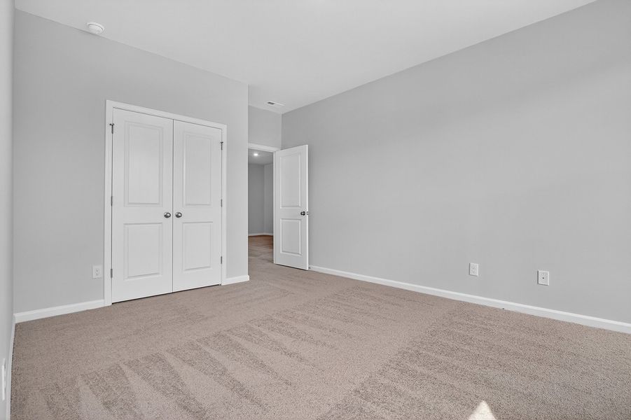 Spacious, unfurnished interior of a new home in Grand Park, Leland (Image 20). Spacious, unfurnished interior of a new home in Grand Park, Leland (Image 20).