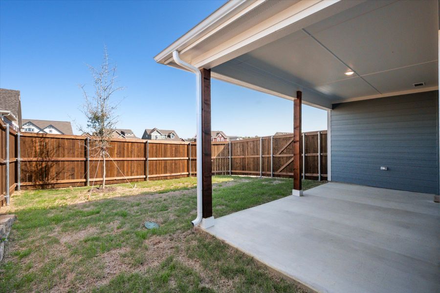 Exterior details and patio area of a home in Heritage Towne, Midlothian (Image 34).