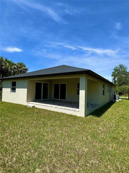 Front exterior of a new home in , Rotonda West, FL, highlighting curb appeal (Image 22).