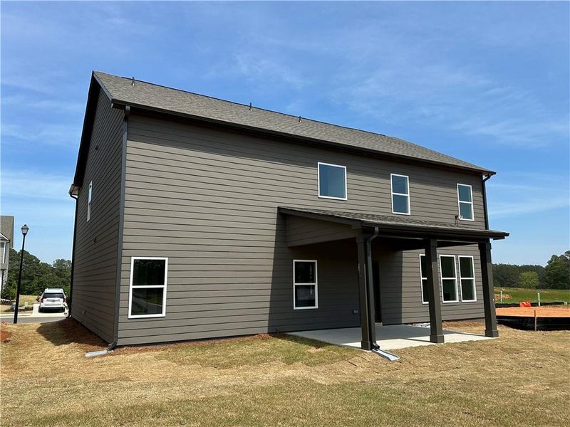 Front exterior of a new home in Summerlin, Winder, GA, highlighting curb appeal (Image 30). Front exterior of a new home in Summerlin, Winder, GA, highlighting curb appeal (Image 30).