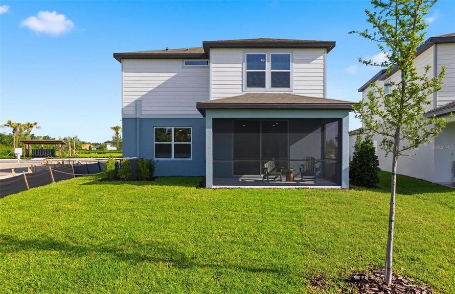 Exterior details and patio area of a home in Oakfield Trails, Parrish (Image 24).