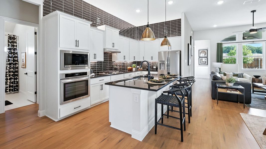 Representative furnished interior of a home built from the Juniper by Brightland Homes in Anna Ranch, Anna (Image 3).