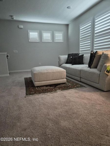 Furnished interior view inside a new home in Condo Collection at Grand Vue at Interlocken, Fernandina Beach (Image 17).