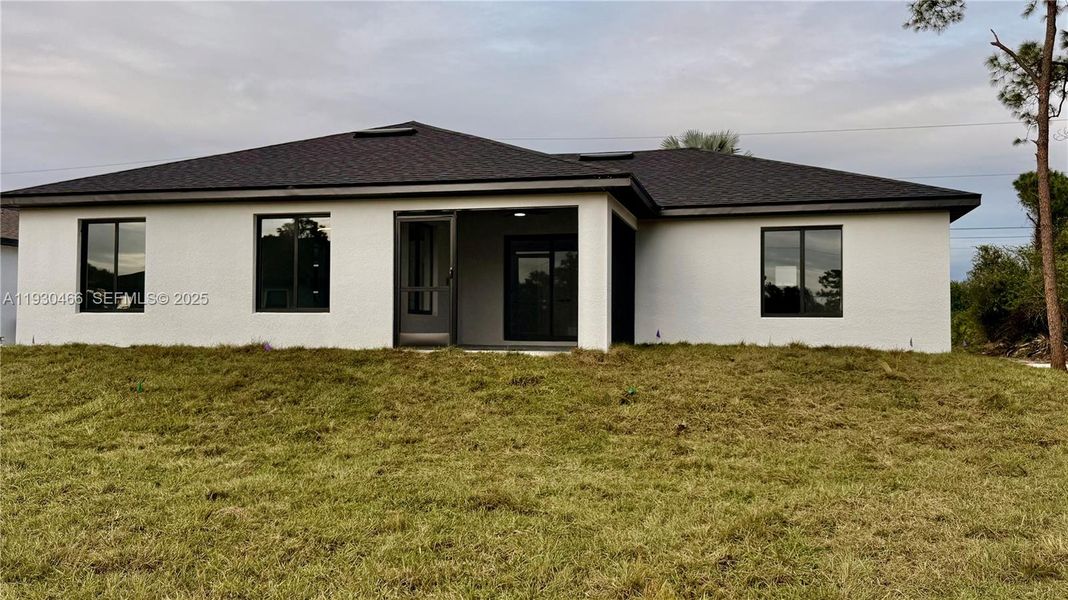 Exterior details and patio area of a home in , Lehigh Acres (Image 3).