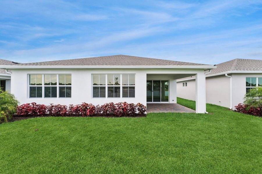 Front exterior of a new home in , Port St. Lucie, FL, highlighting curb appeal (Image 1). Front exterior of a new home in , Port St. Lucie, FL, highlighting curb appeal (Image 1).