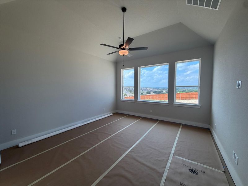 Primary Bedroom with elevated ceiling