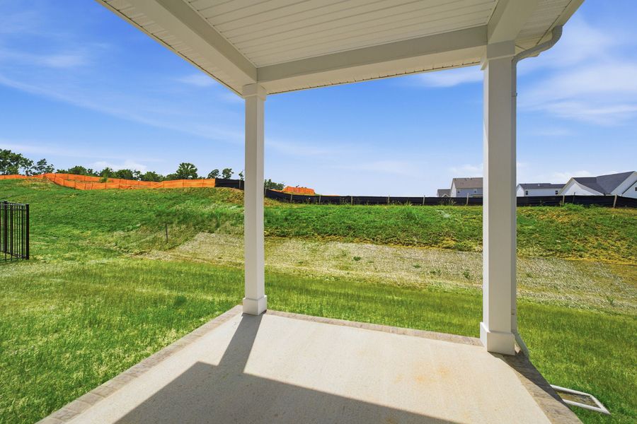 Exterior details and patio area of a home in Dorris Farm, White House (Image 3).