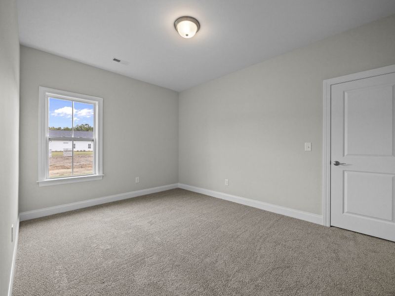 Spacious, unfurnished interior of a new home in The Villas at Langston Farms, Winterville (Image 28).