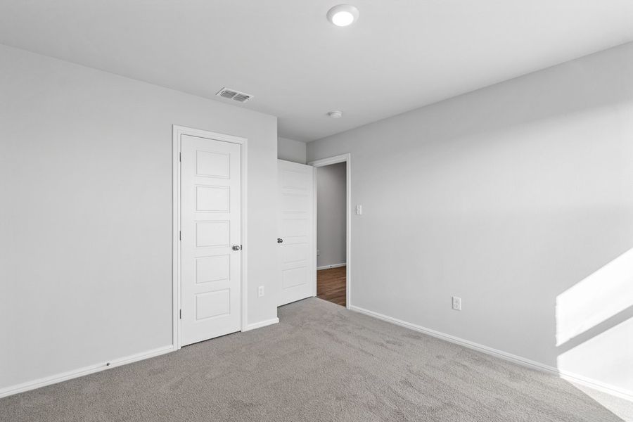 Representative unfurnished interior of a home built from the TEXAS CALI by D.R. Horton in Faculty Row, Abilene (Image 55).