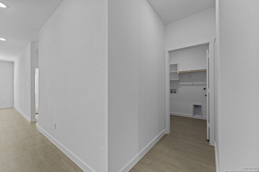 Spacious, unfurnished interior of a new home in Waterwheel: Coastline Collection, San Antonio (Image 26).