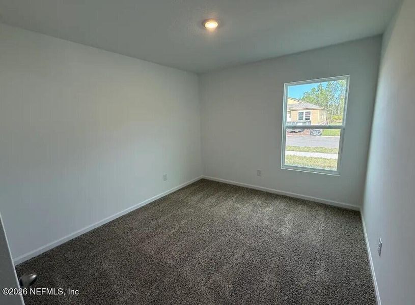 Spacious, unfurnished interior of a new home in Sawmill Branch, Palm Coast (Image 20).