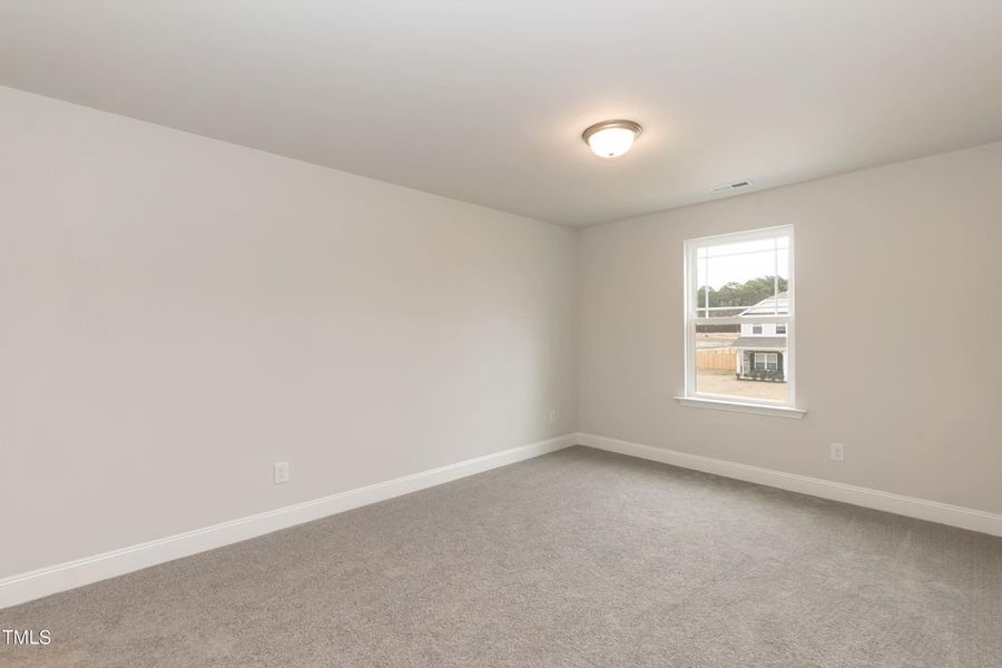 Representative unfurnished interior of a home built from the 2913 by Adams Homes in Hidden Pines, Cameron (Image 35).
