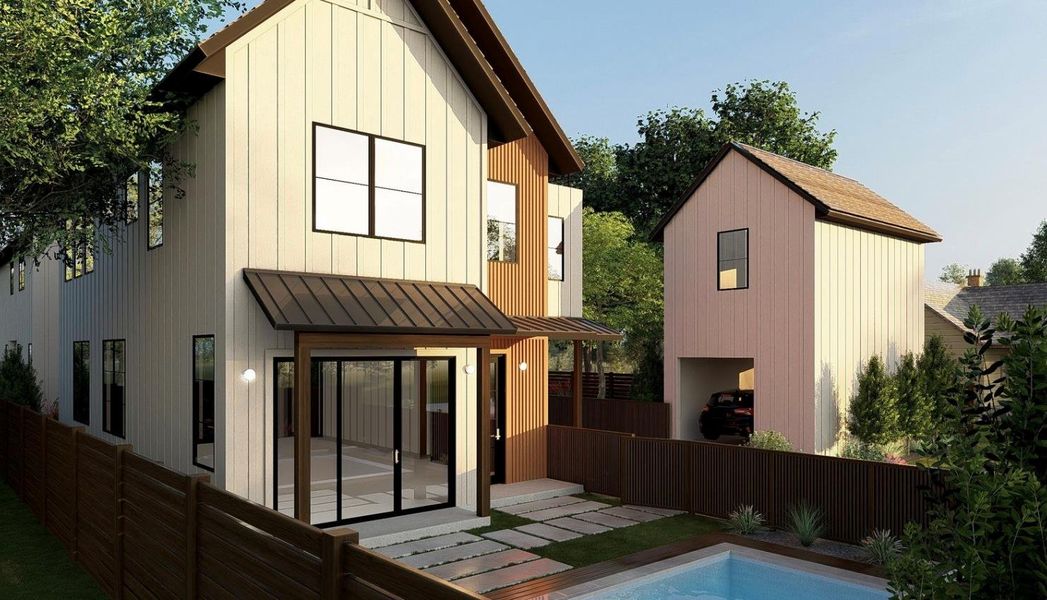 Rear view of property featuring a standing seam roof, a fenced backyard, a metal roof, and a patio Rear view of property featuring a standing seam roof, a fenced backyard, a metal roof, and a patio