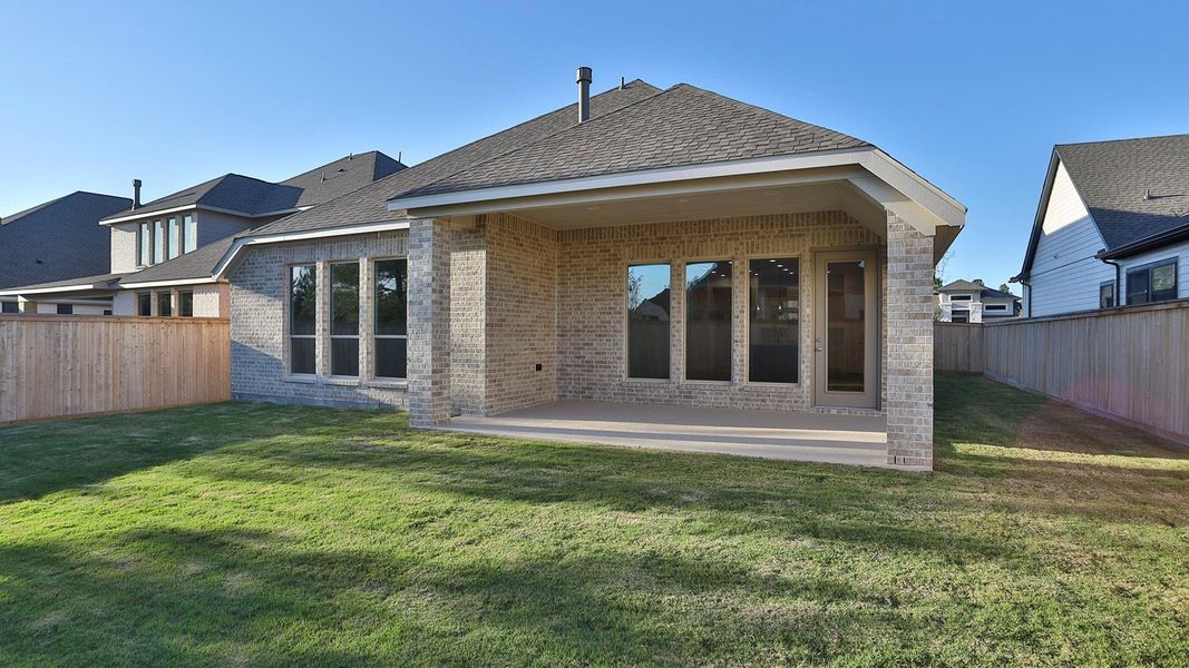 Exterior details and patio area of a home in Kresston 50', Magnolia (Image 3).