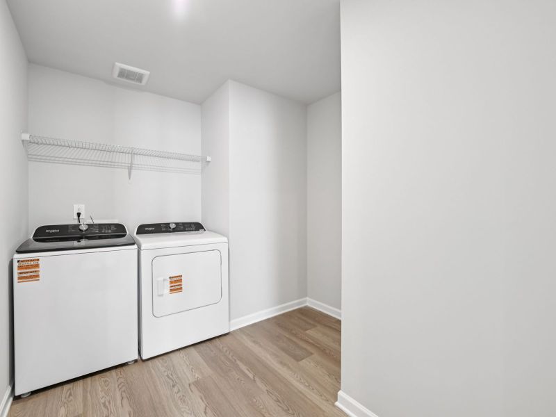 The Taylorsville floorplan with the Divine White interior package.