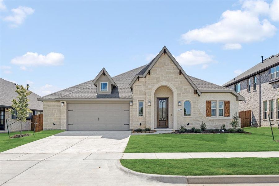 Front exterior of a new home in Hampton Park, Glenn Heights, TX, highlighting curb appeal (Image 21). Front exterior of a new home in Hampton Park, Glenn Heights, TX, highlighting curb appeal (Image 21).
