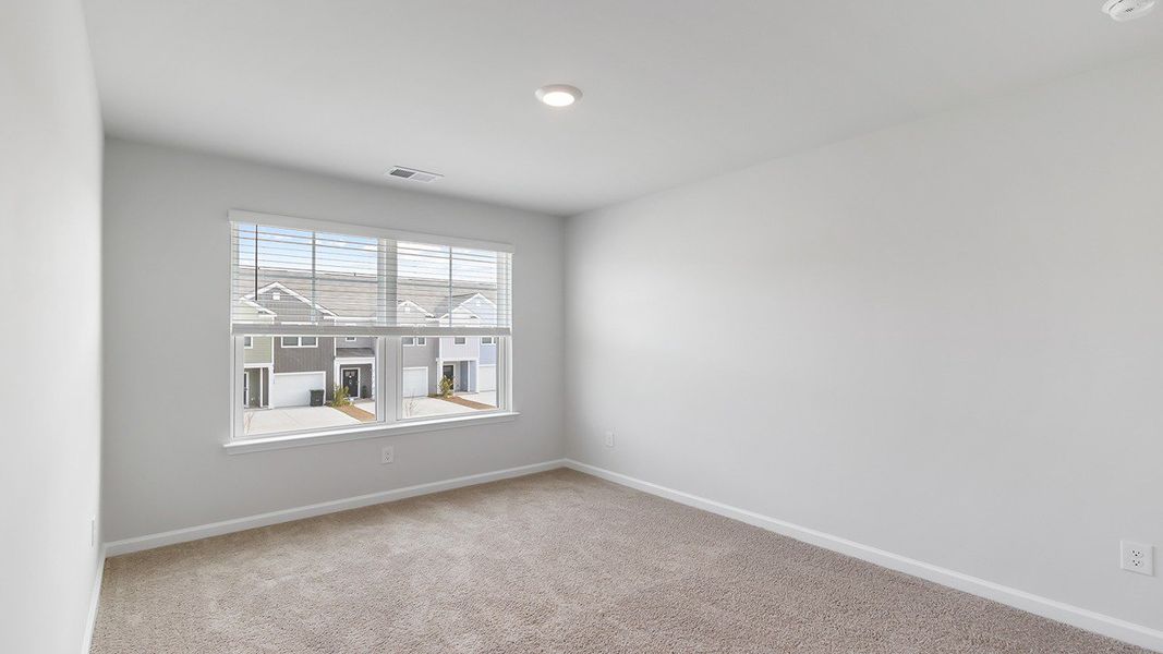 Spacious, unfurnished interior of a new home in Carolina Groves Townhomes, Moncks Corner (Image 18).