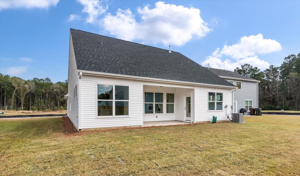 Exterior details and patio area of a home in Oakley Pointe, Moncks Corner (Image 19).