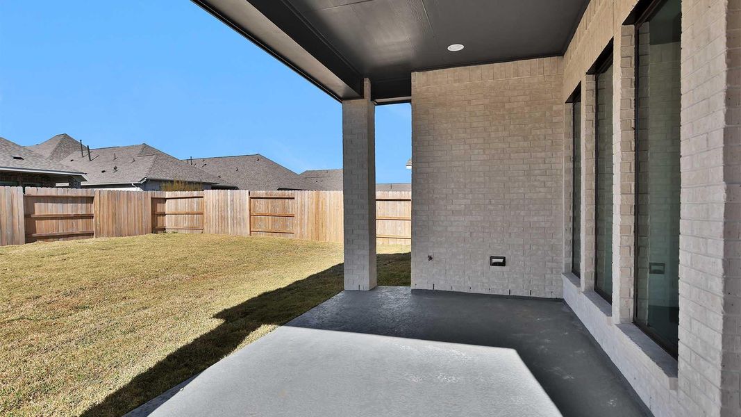Exterior details and patio area of a home in Marvida, Cypress (Image 4).