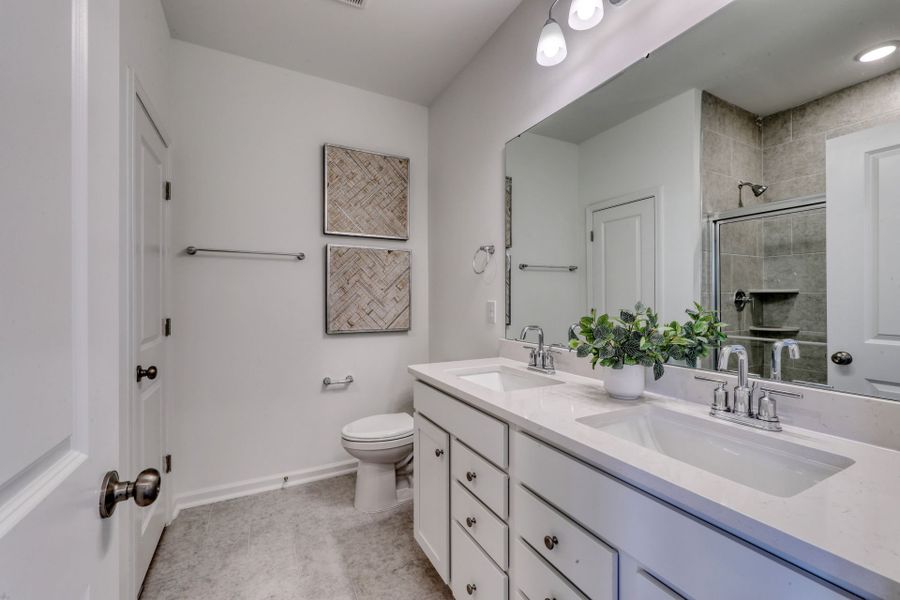 Guest Bath with Double Vanity. Model Home Representation.