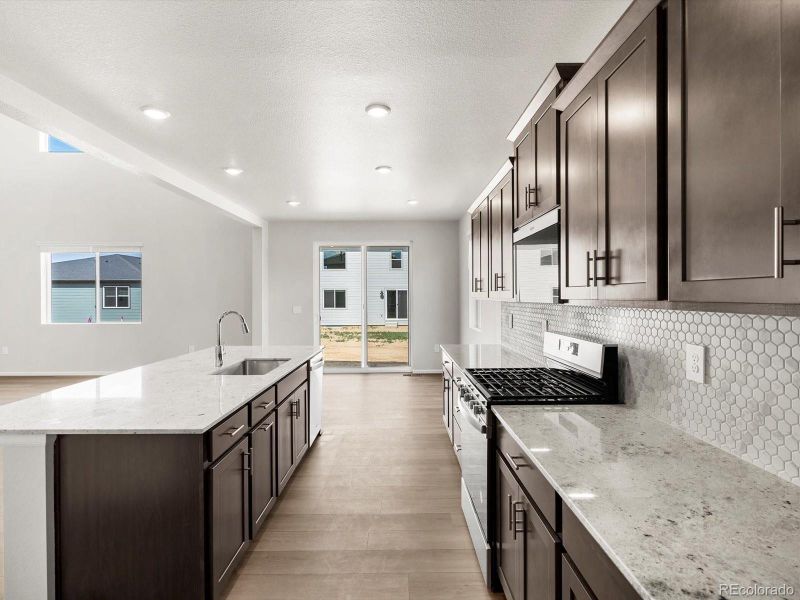 Furnished interior view inside a new home in Poudre Heights: The Alpine Collection, Windsor (Image 6).