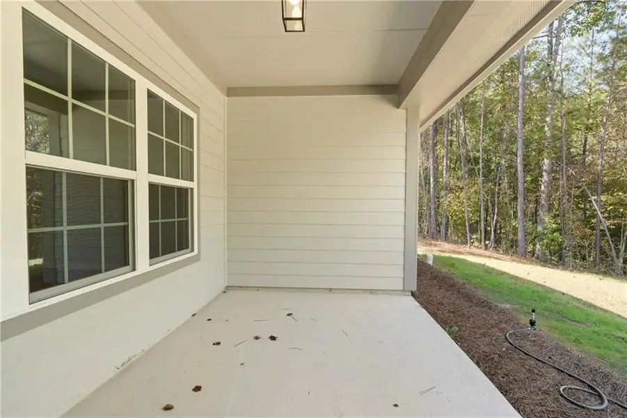 Exterior details and patio area of a home in , Gray (Image 3).