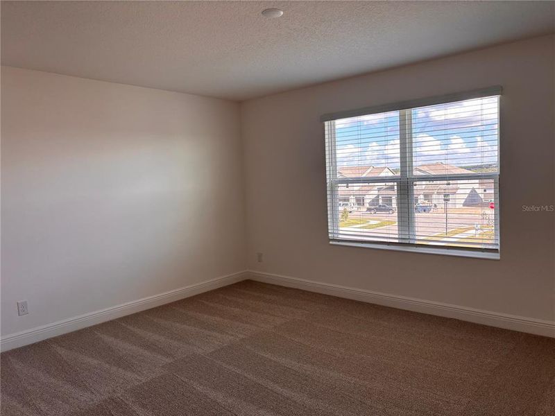 Spacious, unfurnished interior of a new home in Trinity Lakes, Groveland (Image 8).