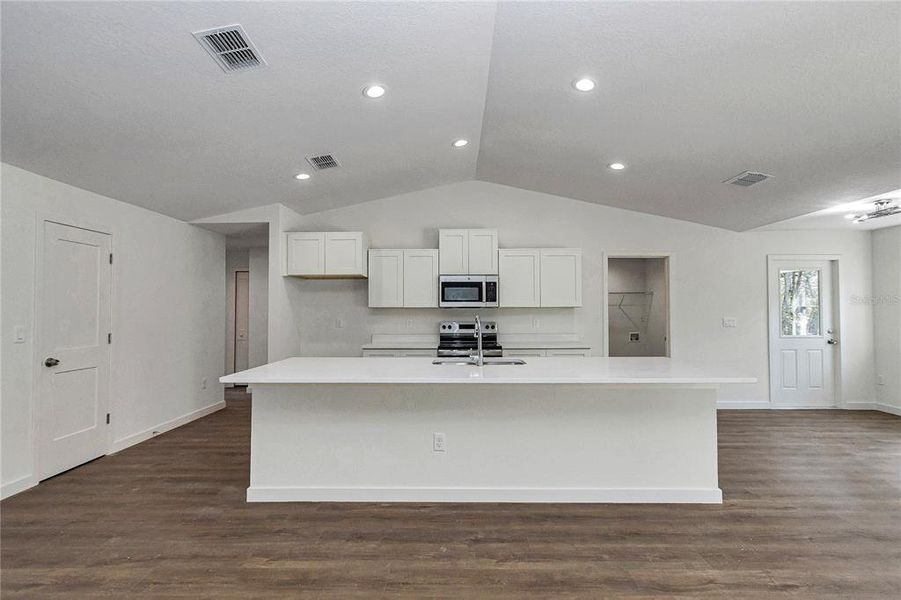 Furnished interior view inside a new home in , Dunnellon (Image 8).