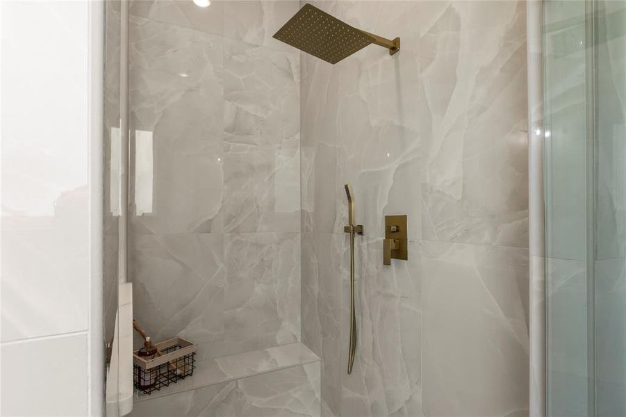 Full bathroom featuring a marble finish shower Full bathroom featuring a marble finish shower