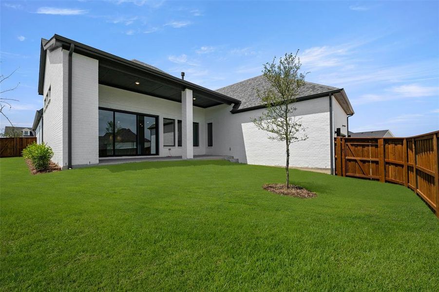 Front exterior of a new home in Walsh Ranch 60', Fort Worth, TX, highlighting curb appeal (Image 18). Front exterior of a new home in Walsh Ranch 60', Fort Worth, TX, highlighting curb appeal (Image 18).