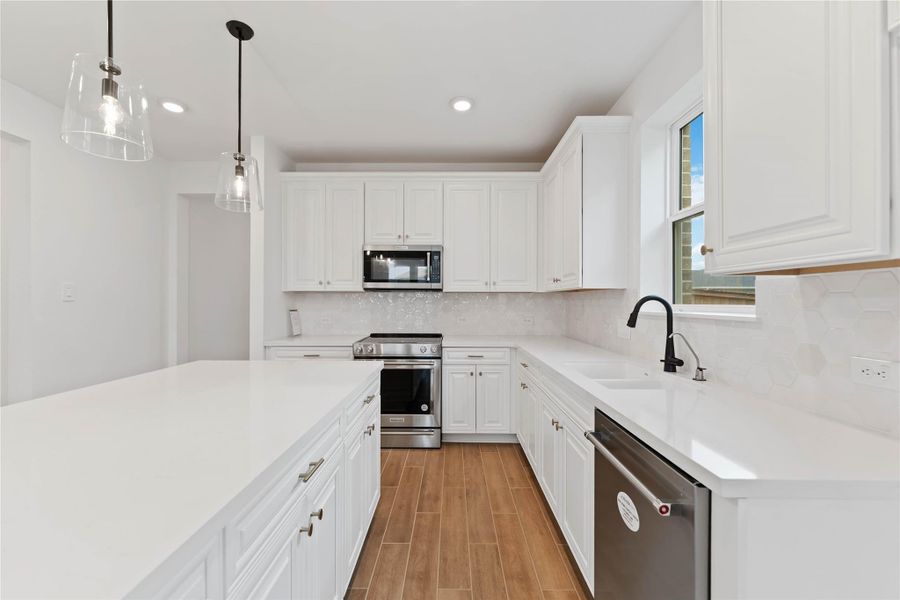Furnished interior view inside a new home in Sunterra, Katy (Image 6).