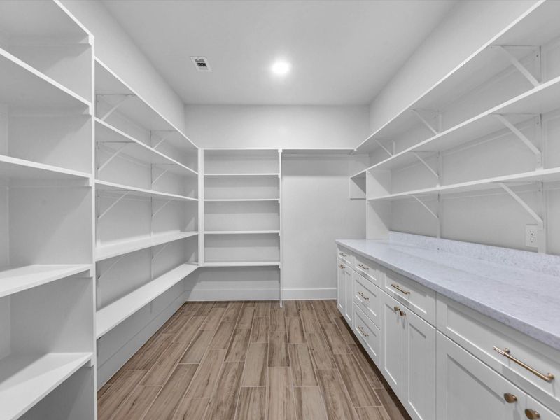 this open concept pantry is big enough to store all your gadgets and yummy goods!