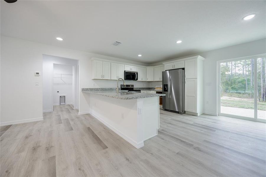 Furnished interior view inside a new home in , Williston (Image 4).