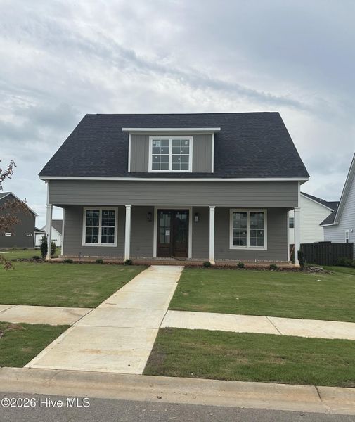Front exterior of a new home in Highland Lakes, Evans, GA, highlighting curb appeal (Image 1). Front exterior of a new home in Highland Lakes, Evans, GA, highlighting curb appeal (Image 1).