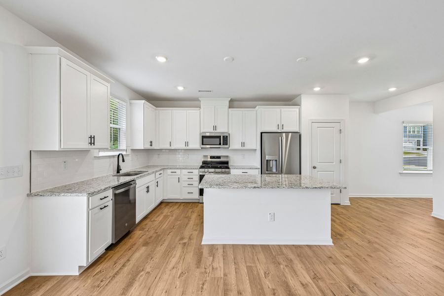 Furnished interior view inside a new home in Forestville Station, Wake Forest (Image 6).