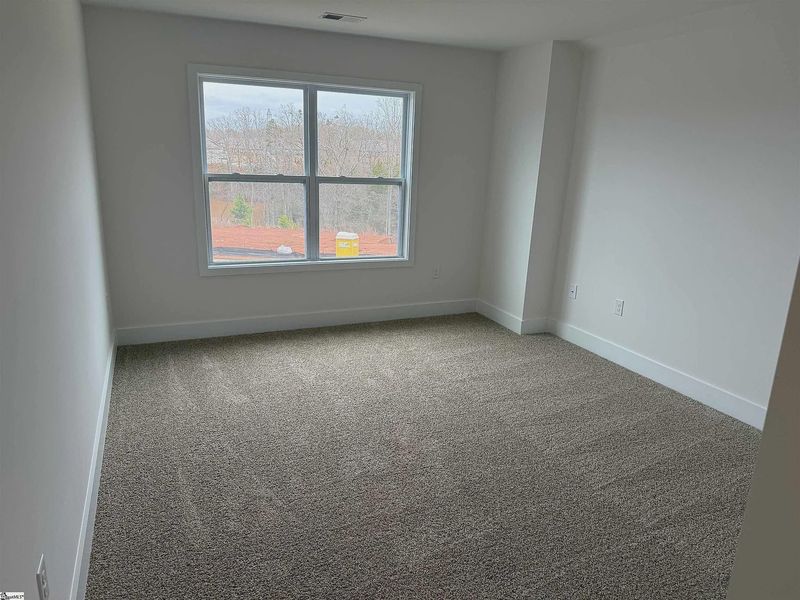 Spacious, unfurnished interior of a new home in Hidden Lake Estates, Greenville (Image 20).