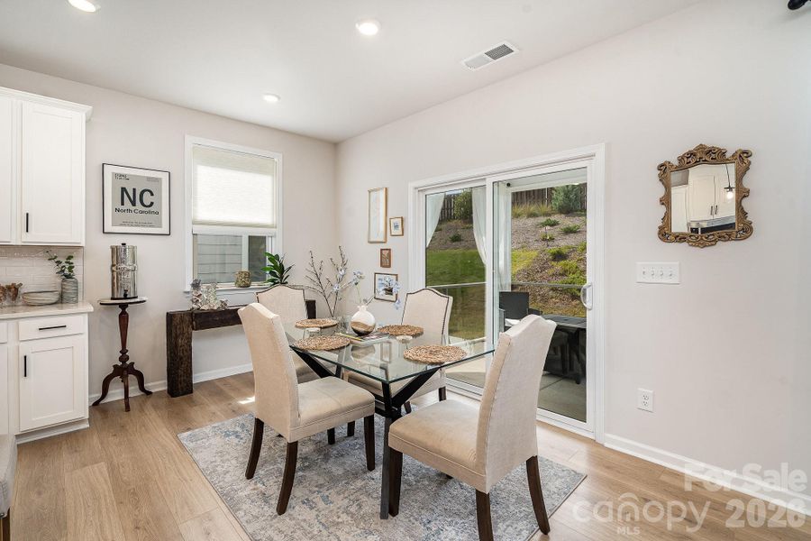 Furnished interior view inside a new home in Village at North Reach, Charlotte (Image 12).